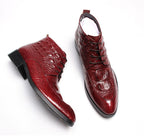 Burgundy lace-up dress boots, left side view with wingtip pattern and low block heel