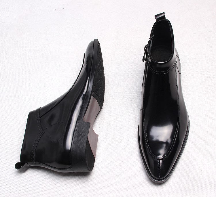 Men's leather side-zip boots with thick sole, black finish, angled view