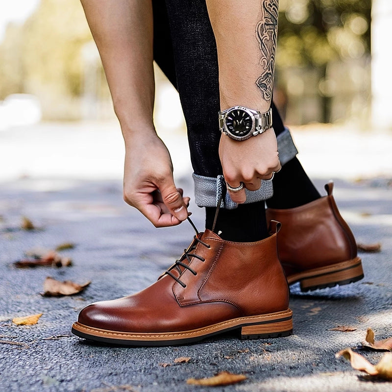 Men's brown leather lace-up chukka boots with plain toe and decorative stitching