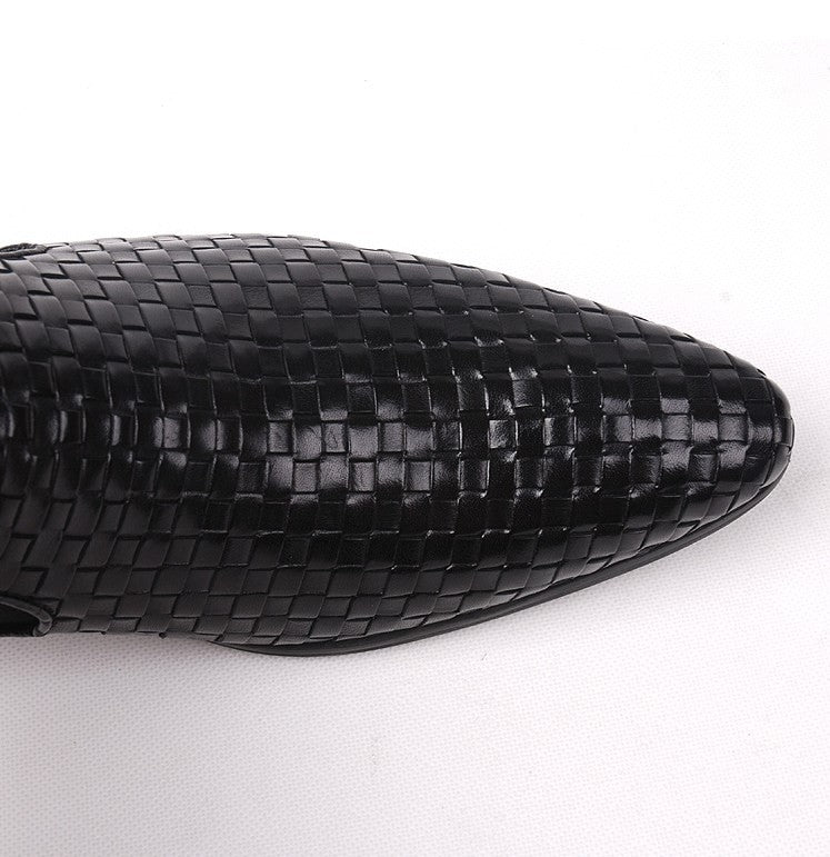 Black leather boot toe with woven braid pattern and pointed shape