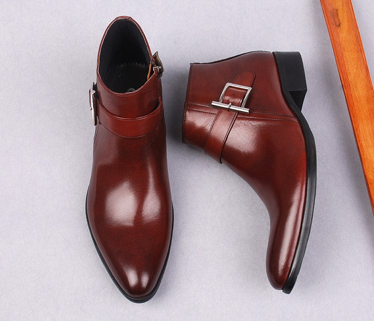 Men's burgundy leather side-zip dress boots with buckle strap, thick sole.