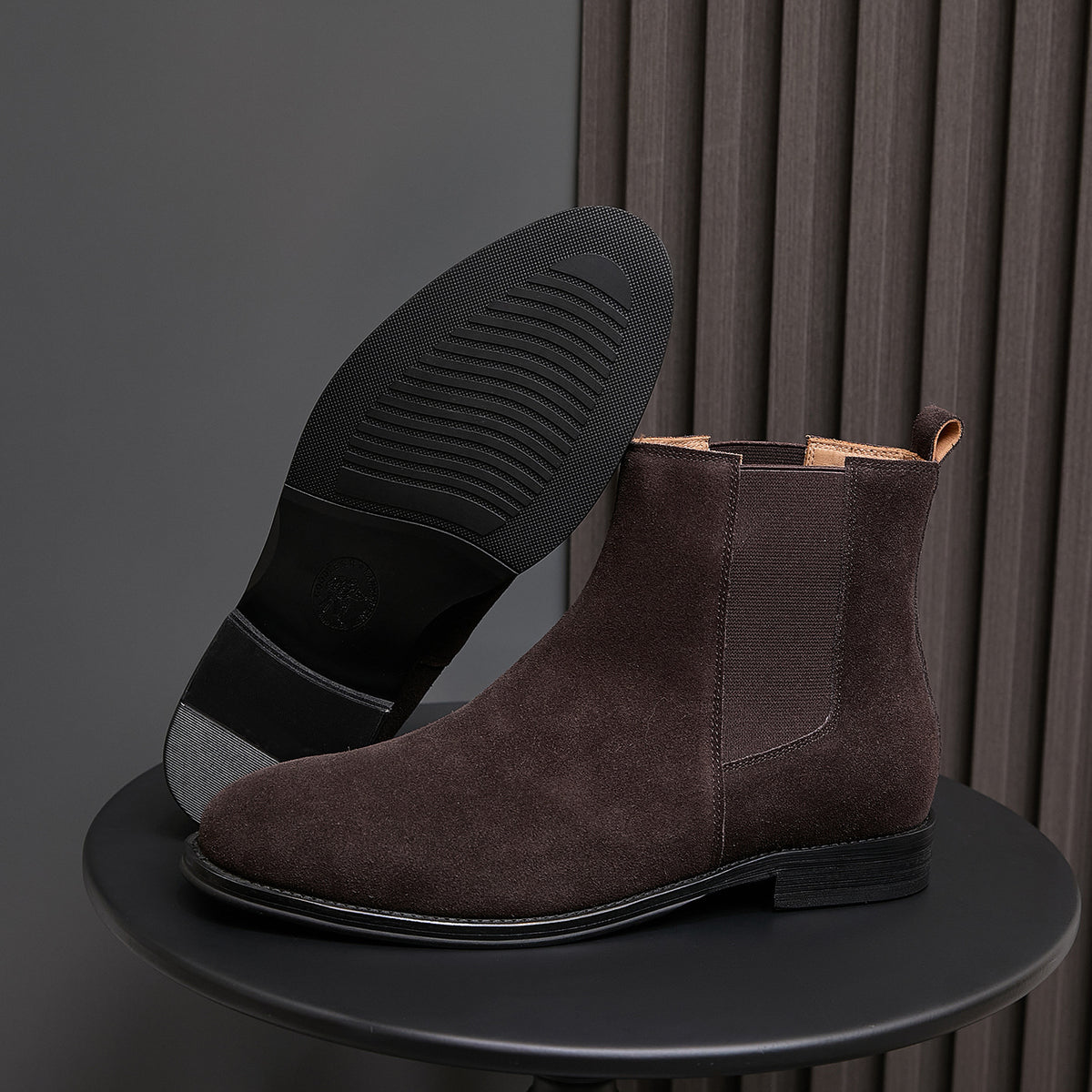 Men's pointed-toe suede Chelsea dress boots, dark brown, side view with outsole
