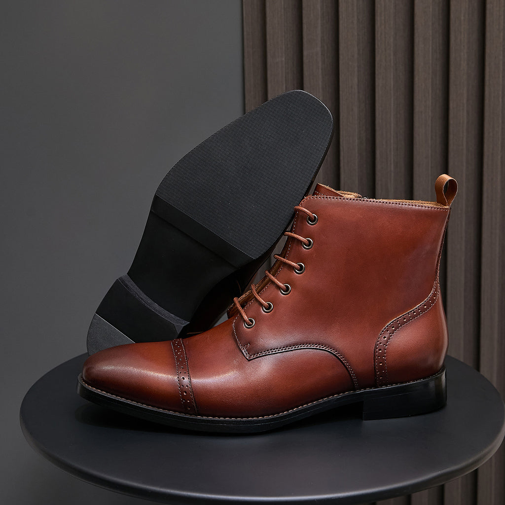 Men's brown leather pointed-toe ankle boots with lace-up front and side pull tab