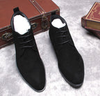 Black suede lace-up dress boots, front view showing tongue and lace closure