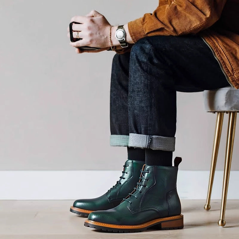 Green leather ankle boots with pointed toe, lace-up front and thick rubber sole