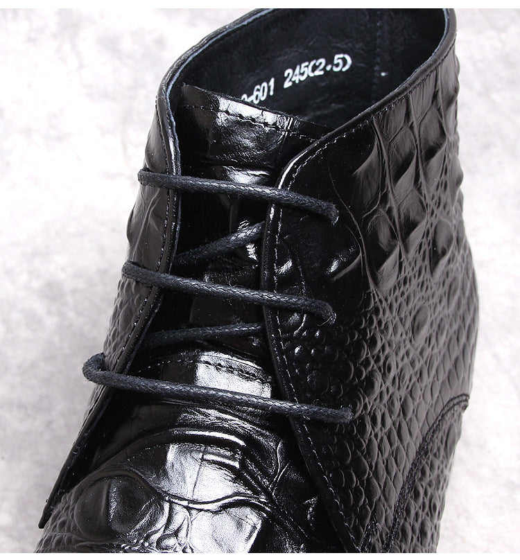 Men's black lace-up dress boot with textured upper and stitched wingtip-style detailing