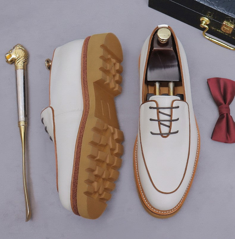 Men's chunky lug-sole oxfords in white, outsole and side view with brown trim
