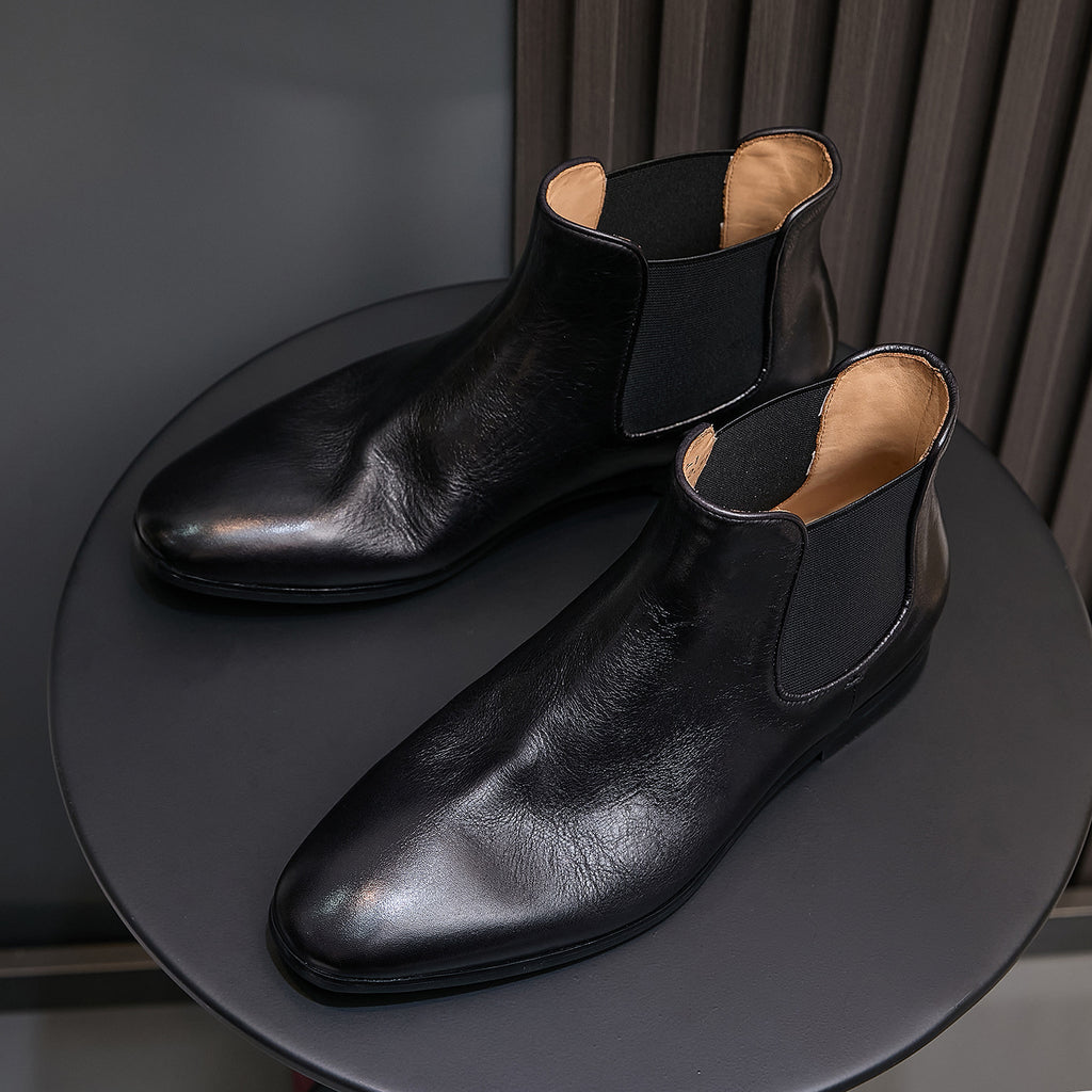 Pointed-toe suede Chelsea dress boots in black, elastic side gore, tan lining
