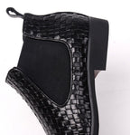 Black leather side-zip dress boot cuff with woven texture and elastic side panel