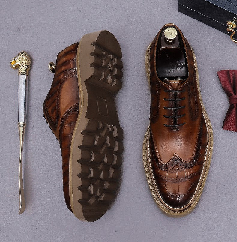 Men's chunky lug sole wingtip brogue oxford shoes, brown with tread outsole view