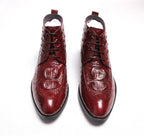 Burgundy lace-up dress boots, top view with lace-up closure and glossy patterned finish