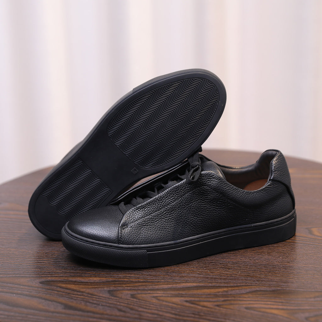 Men's black genuine leather sneaker, rubber outsole tread, lace-up low-top