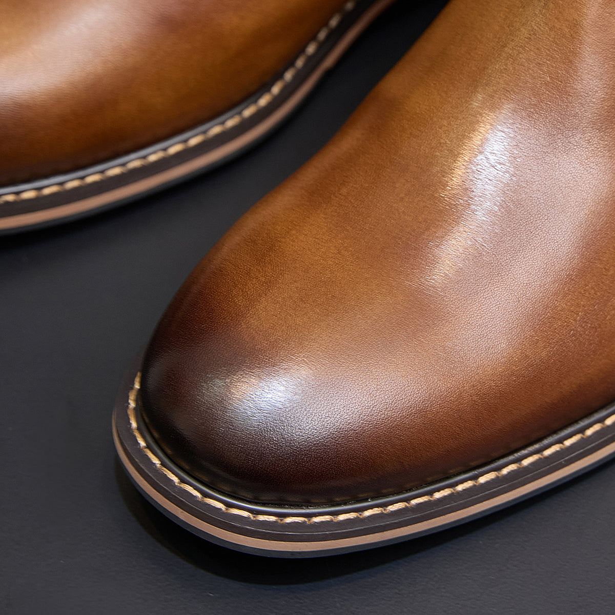 Men's suede chelsea boot toe, brown pointed finish with stitched sole