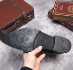 Men's brown leather side-zip boots with patterned outsole and thick sole