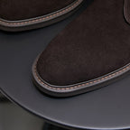 Men's dark brown suede chukka boot toe with contrast stitched midsole