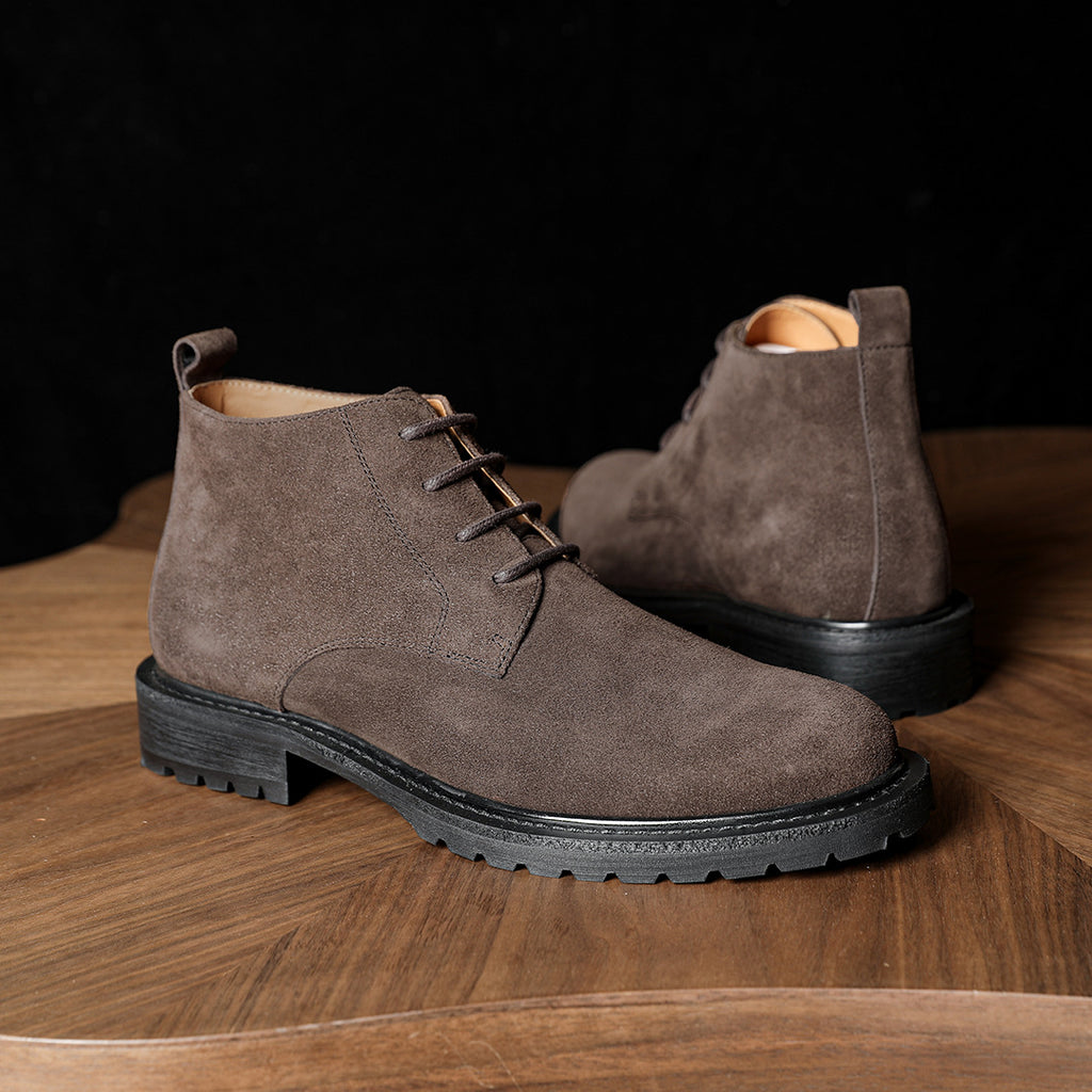 Men's dark brown lace-up chukka boots with plain toe and chunky black sole