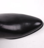 Black leather dress boot toe with smooth rounded cap