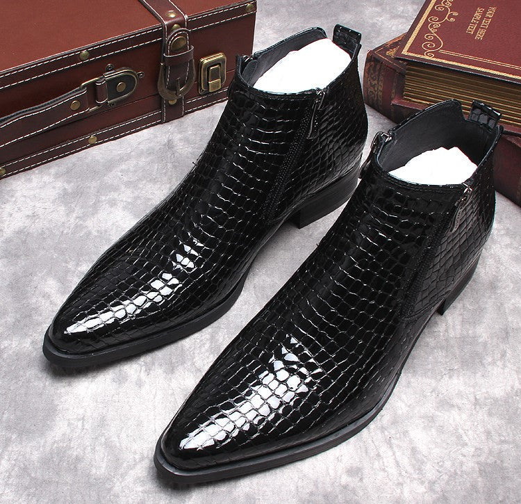 Men's leather side-zip dress boots, black crocodile texture, angled front pair view, thick sole