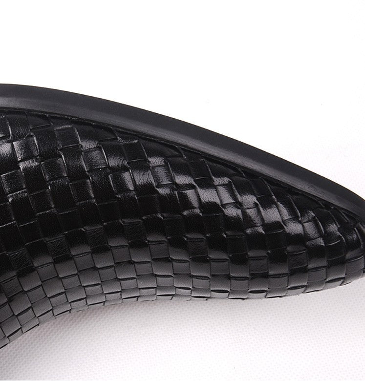 Black leather boot outsole with woven texture along the curved edge