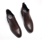 Men's dark brown woven leather slip-on Chelsea boots with elastic gore and cushioned lining