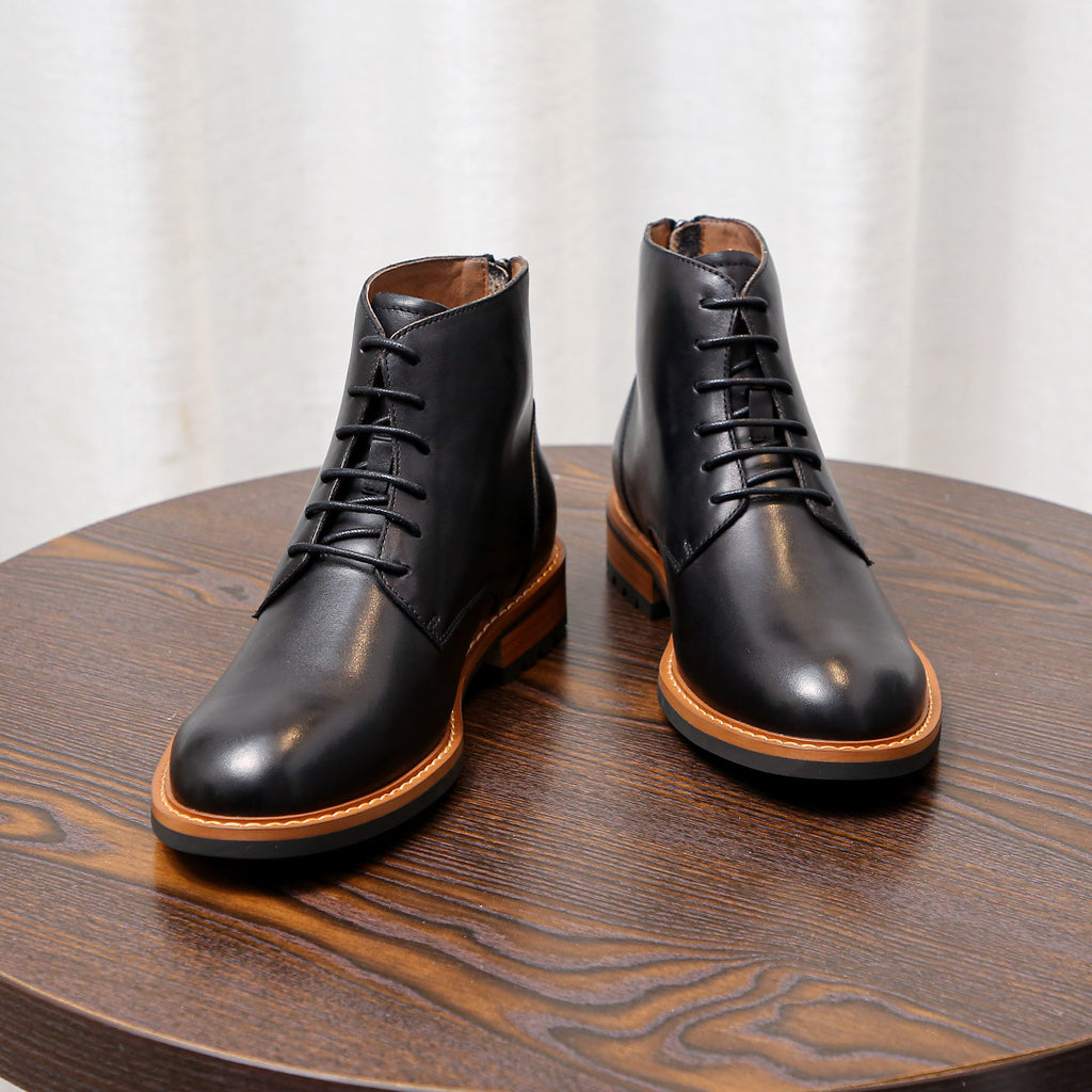 Men's black leather lace-up ankle boots with orange edge welt and cushioned lining