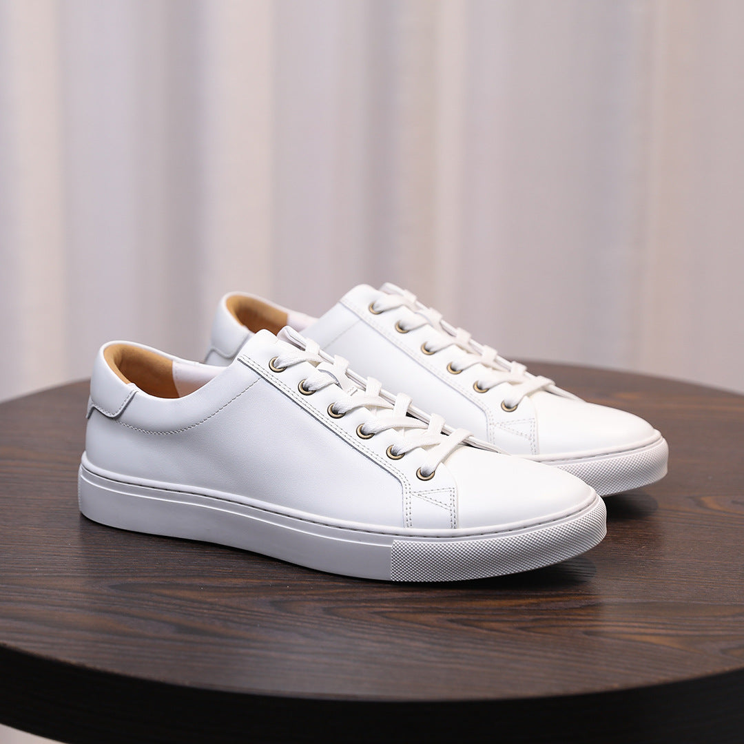 Men's genuine leather sneakers, white, lace-up low-top with rubber sole.