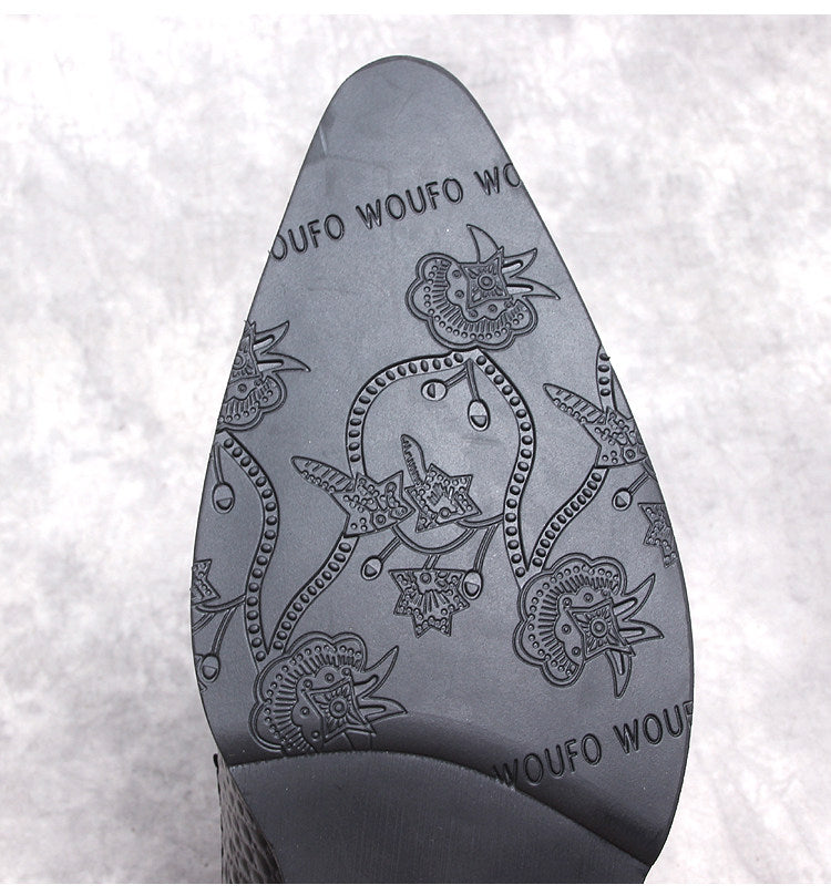 Men's black dress boot outsole with patterned traction grip and brand text