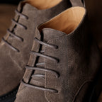 Men's chukka boots in dark brown suede with plain toe and lace-up front