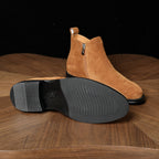 Men's pointed-toe leather side-zip dress boots, outsole view, brown suede
