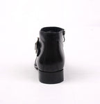 Black leather ankle boot with side zipper and thick rubber sole