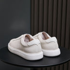 Men's genuine leather sneakers, white low-top slip-on look with rear heel tabs