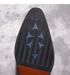 Chelsea boot outsole with star tread pattern and textured grip surface