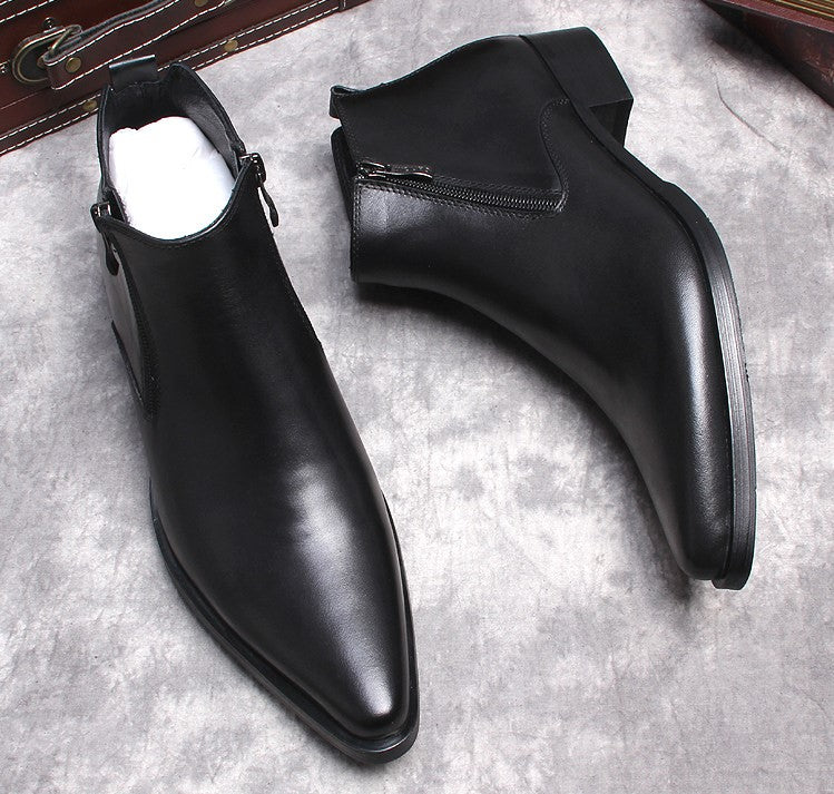 Men's black leather dress boots with side zip, thick sole, pointed toe.