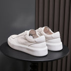 White genuine leather sneakers with heel tab and cushioned collar