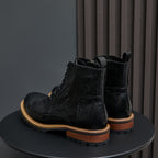 Men's black leather ankle boots with pointed toe, lace-up front, and side zip.