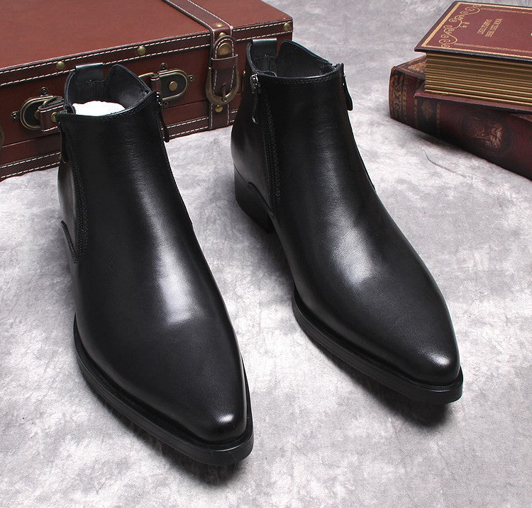 Black leather side-zip dress boots, thick sole and sleek pointed toe, pair view.