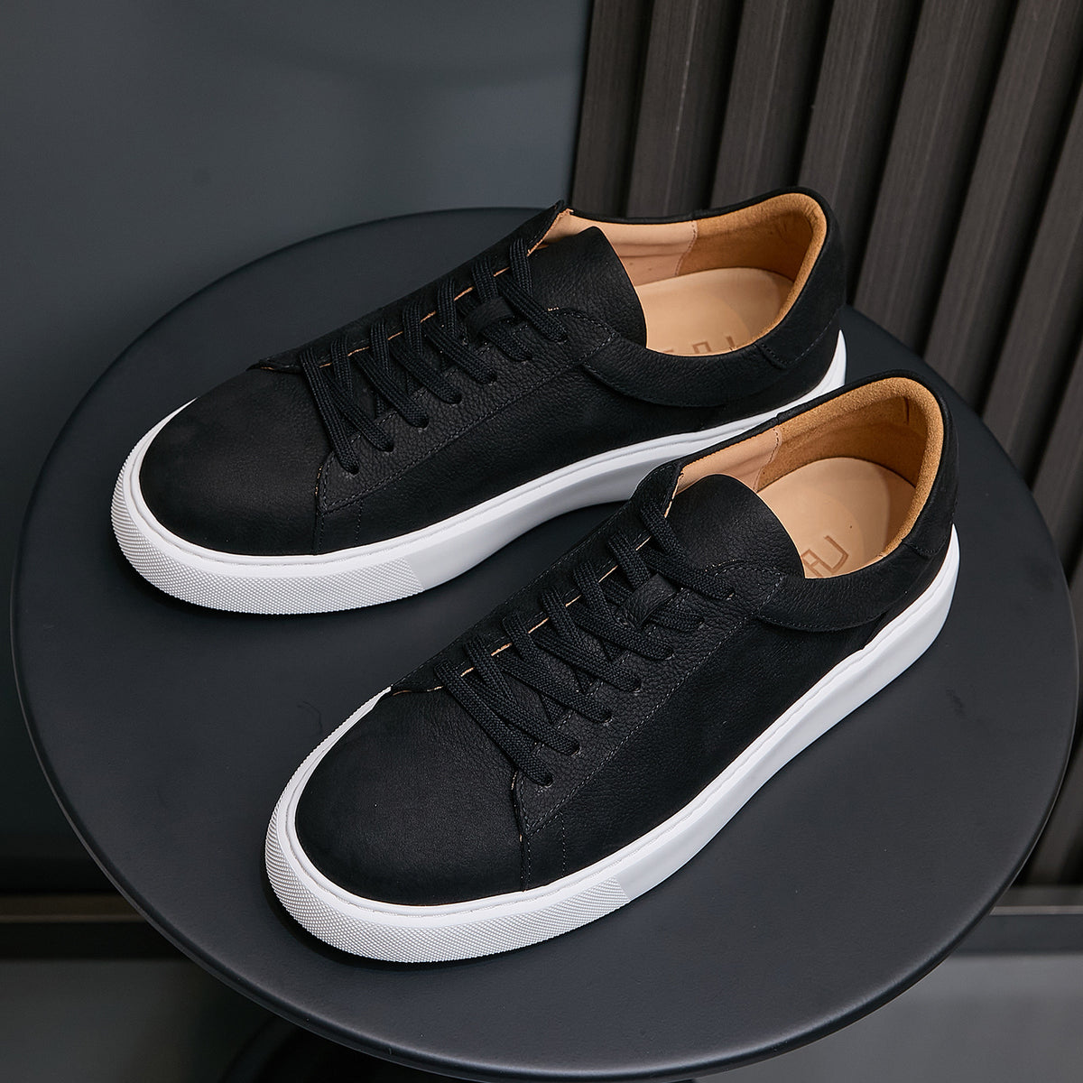 Men's genuine leather sneakers, black, low-profile lace-up with white rubber sole