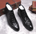Black lace-up dress boots, angled view showing wingtip pattern and low heel