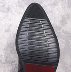 Men's black boot outsole with deep tread and thick sole edge