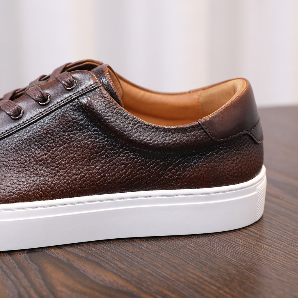 Dark brown genuine leather low-top sneakers, lace-up with white rubber sole