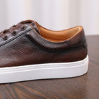 Dark brown genuine leather low-top sneakers, lace-up with white rubber sole