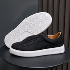 Men's genuine leather sneakers, black, with textured white outsole and lace-up upper