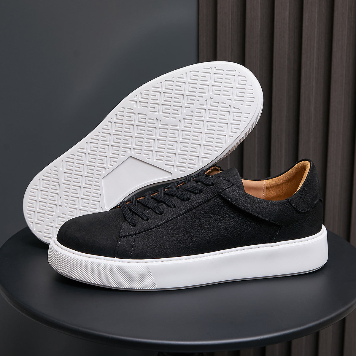 Men's genuine leather sneakers, black, with textured white outsole and lace-up upper
