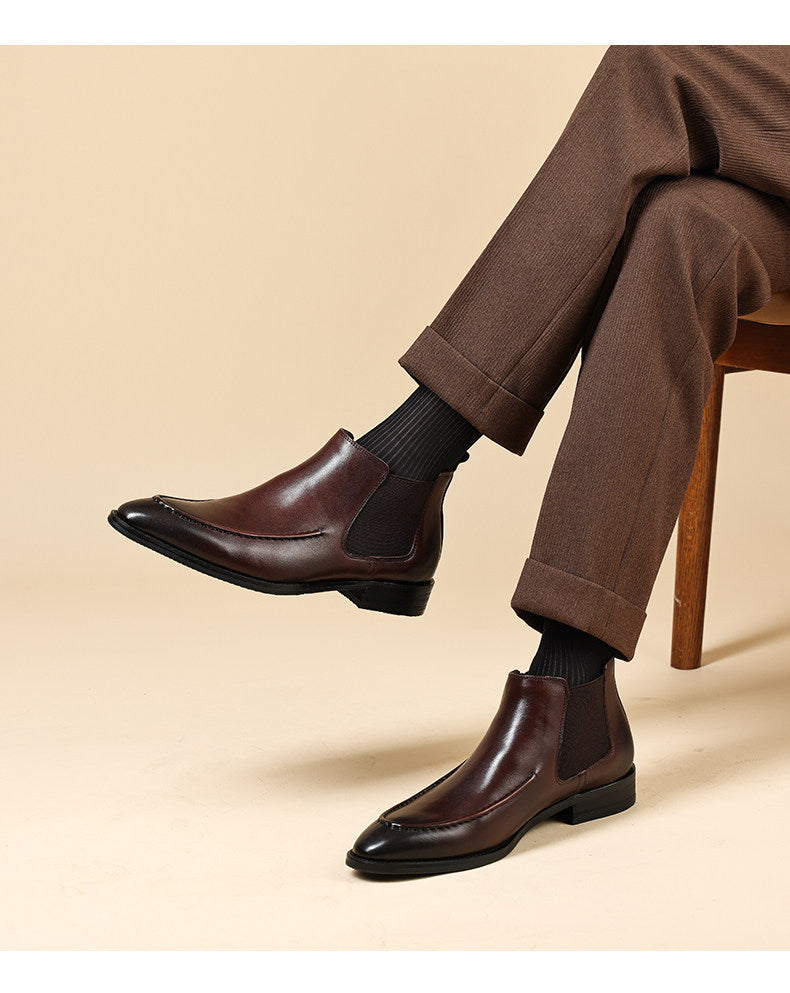 Men's genuine leather Chelsea dress boots worn with dark pants, slip-on ankle style.