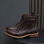 Dark brown leather cap-toe boots with side zip and lace-up, tan welt and lug sole