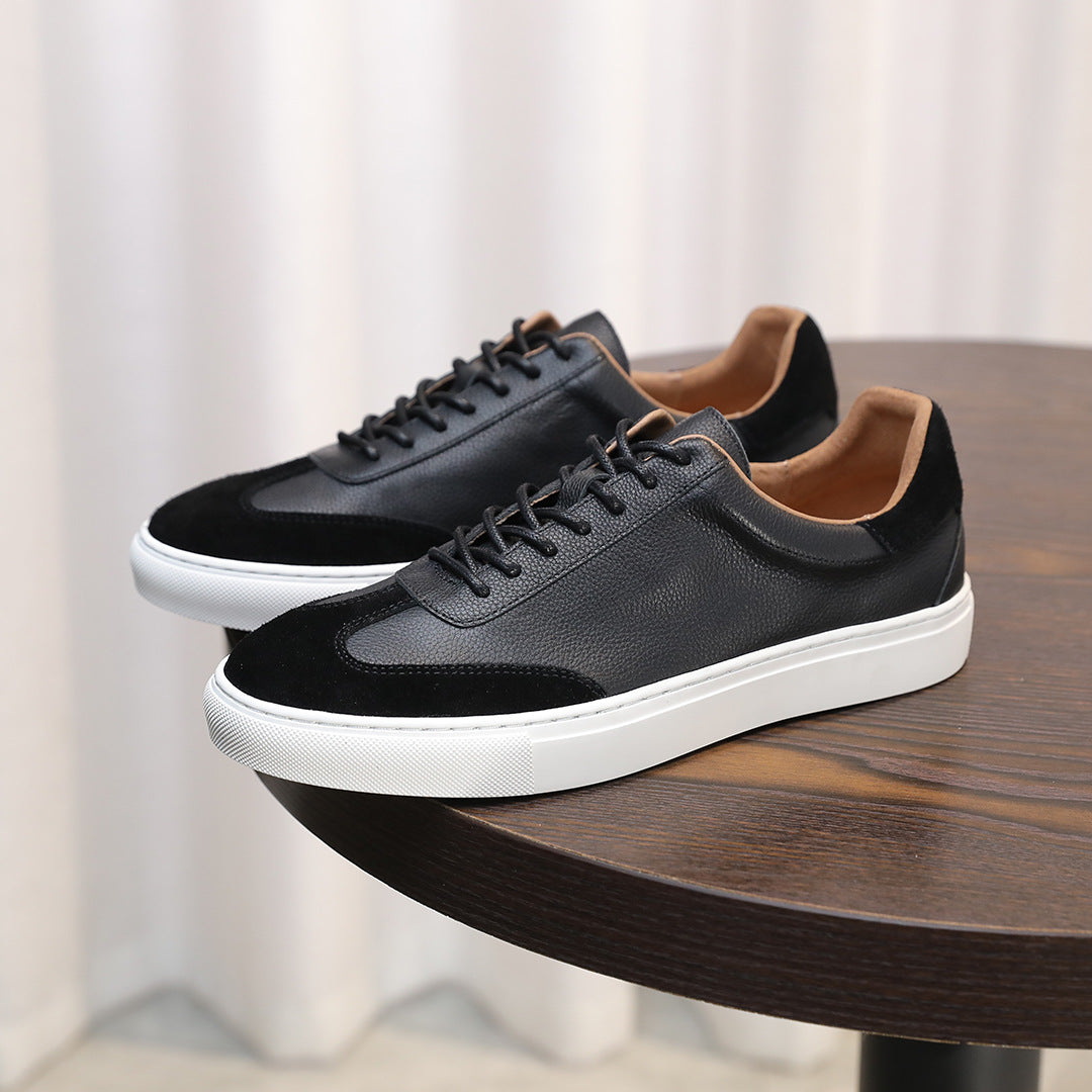 Men's black leather lace-up sneakers with low profile and white rubber midsole