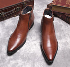 Brown leather side-zip dress boots with thick sole and pointed toe, pair view.