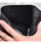 Black leather boot interior with smooth lining and side opening