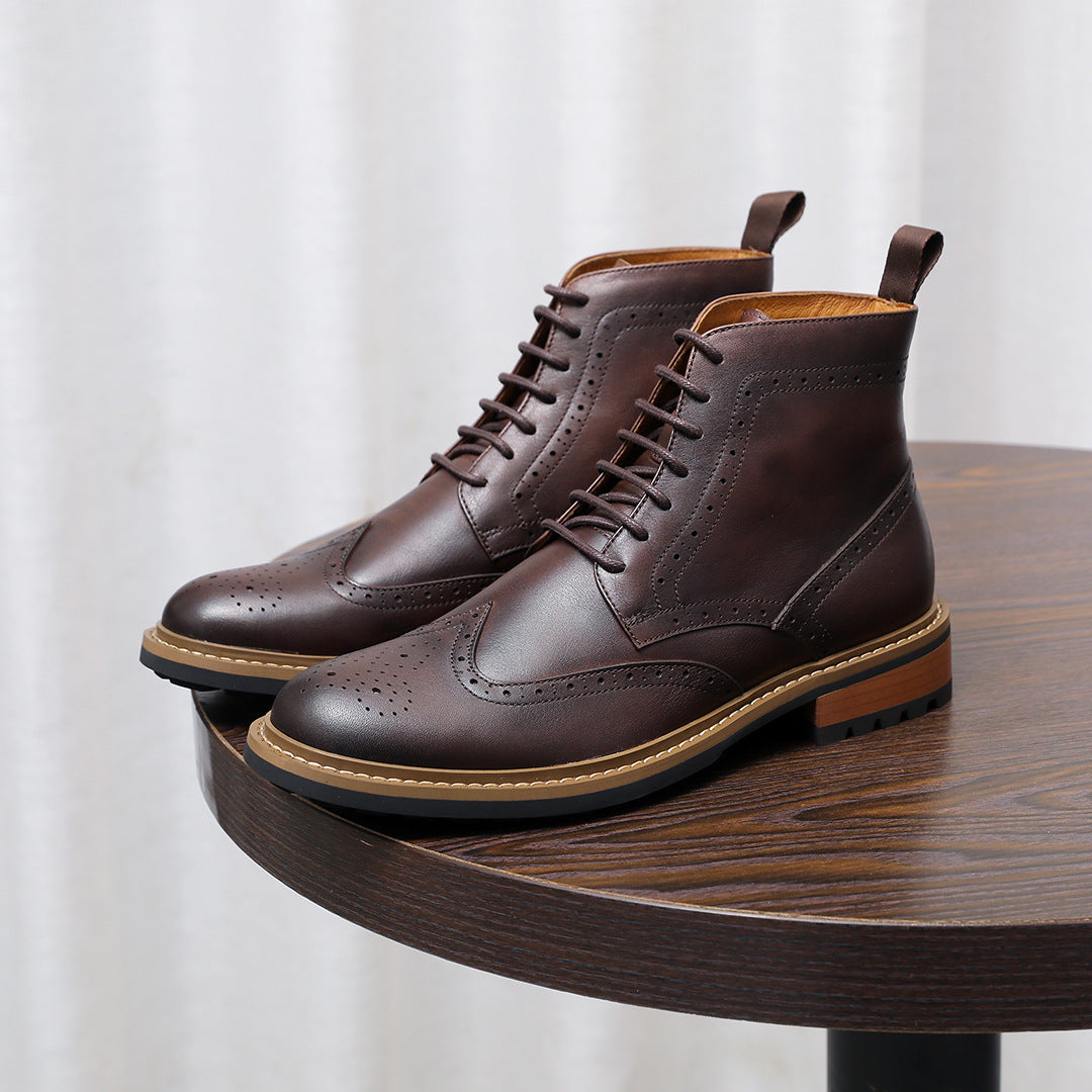 Dark brown leather chukka boots with plain toe, lace-up design, and welted sole