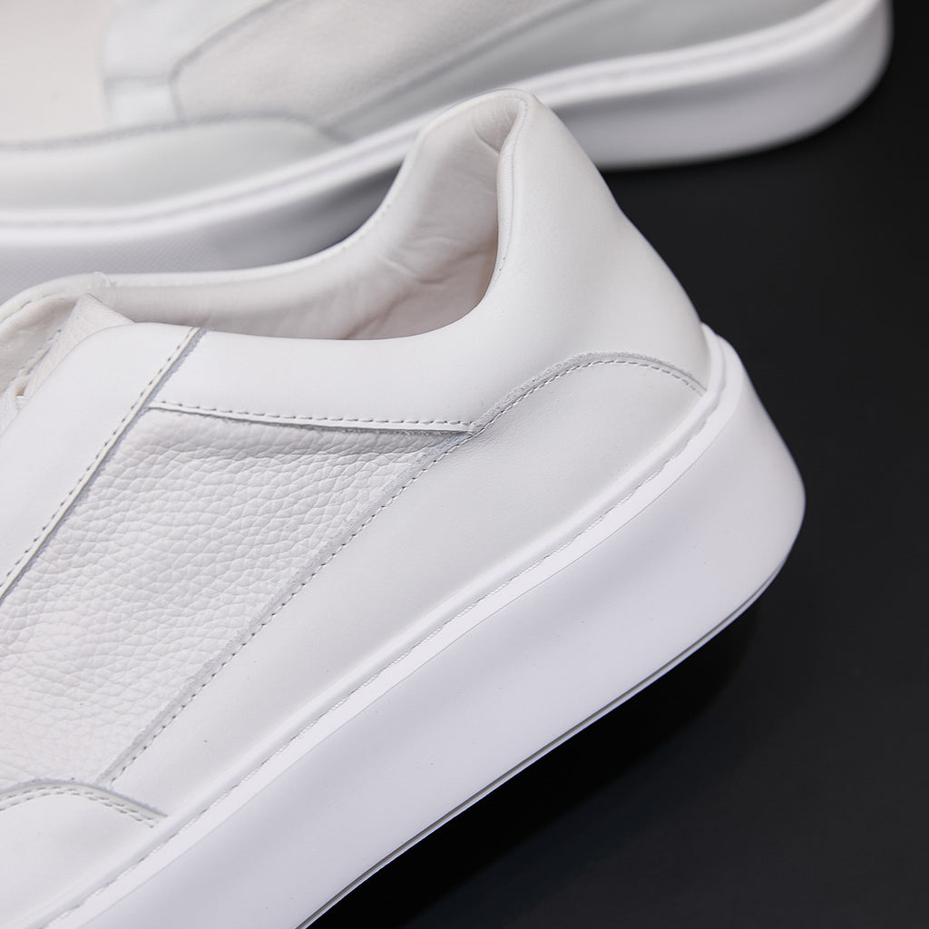 Men's genuine leather sneakers in white, stitched side panel and thick white sole.
